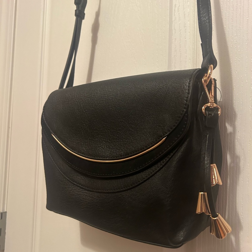 Black Crossbody Bag with Adjustable Strap and Gold-Toned Hardware